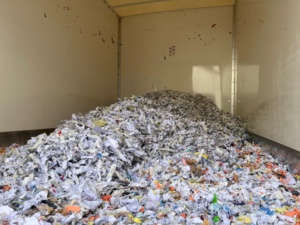 Securely shredded confidential documents ready for recycling after professional document destruction.